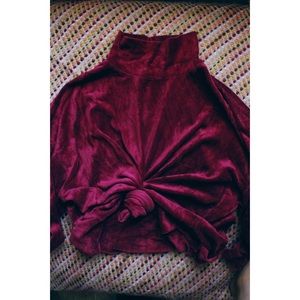 Suede long sleeve turtle neck.